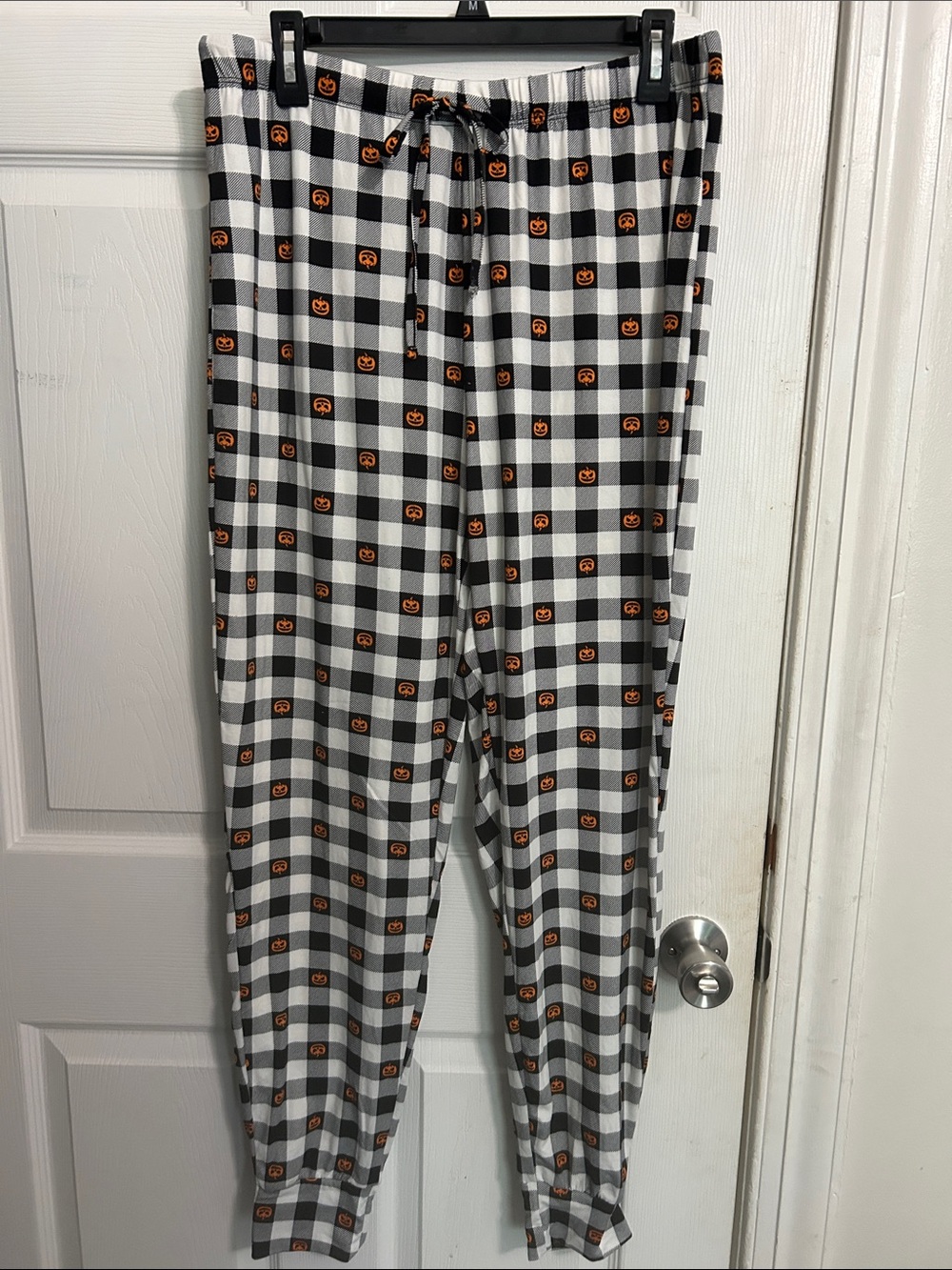 Women’s Black & White Plaid Pajama Pants with Orange Pumpkin Print